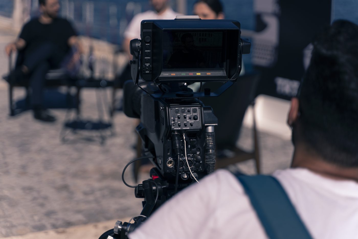 Camera operator filming a corporate shoot